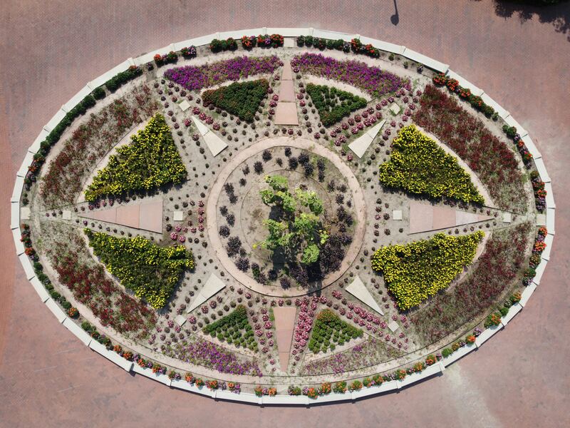 Aerial view of a circular flower garden bed