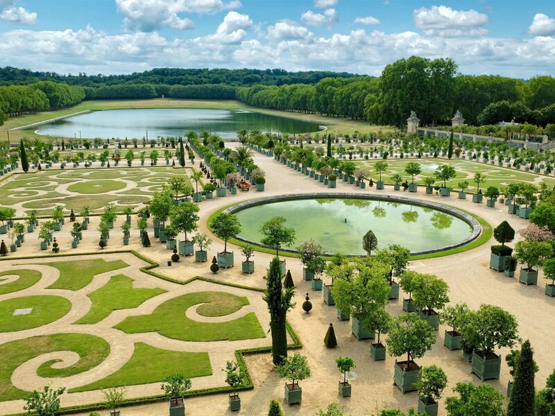 Formal garden with geometric parterre beds and a pond